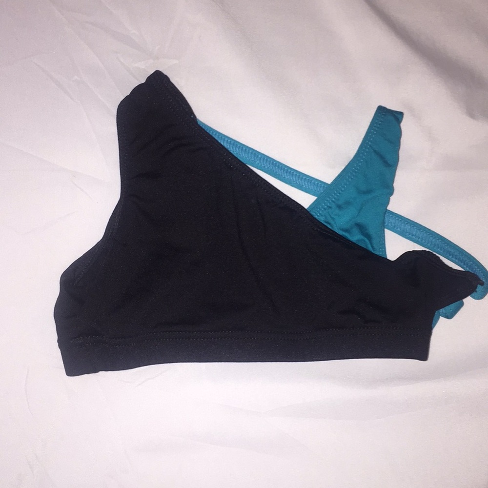 Turquoise and black sports bra